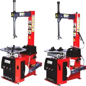 The MT200 Manual Tyre Changer, featuring a sturdy metal frame with a central post for securing the tire. The machine includes an adjustable bead breaker arm and a manual lever for removing and installing tires. Designed for use in automotive repair shops, this device allows for efficient and safe tire changes without the need for powered equipment