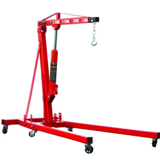 a red hydraulic engine hoist, also known as an engine crane or cherry picker