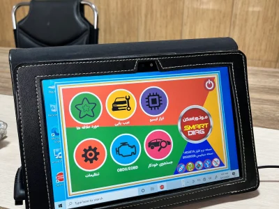 interface with six circular icons labeled in Persian. The icons represent various functionalities related to vehicle diagnostics, including Smart Diag Modulation, Scanner Tool, Troubleshooting, OBDII/OBD Vehicle Search, Favorites, and Settings. In the background, a black chair is partially visible